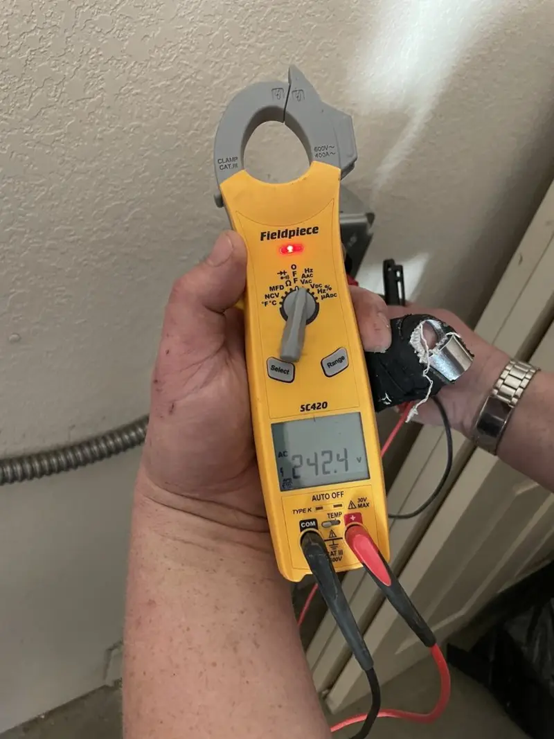 Voltage testing with clamp meter during Generator Installation in San Gabriel